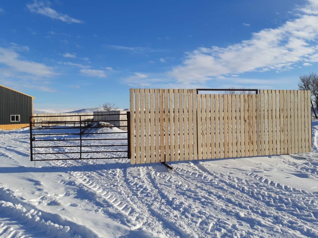 wooden wind break with attached gate
