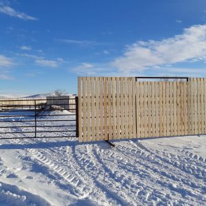 wooden wind break with attached gate